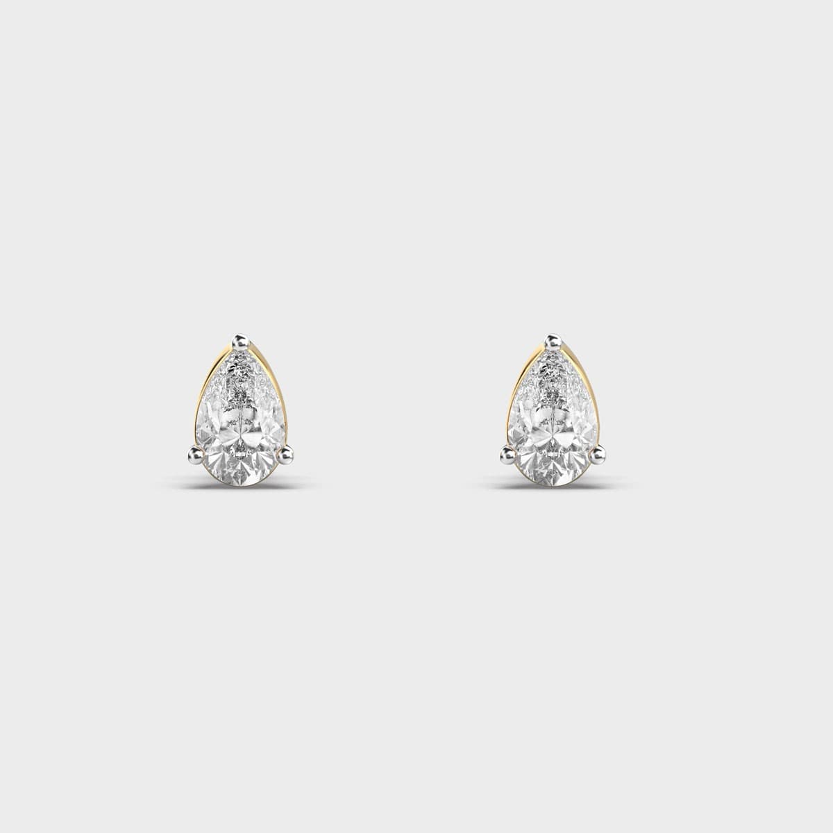 Simple Pear Cut Diamond Ear Studs