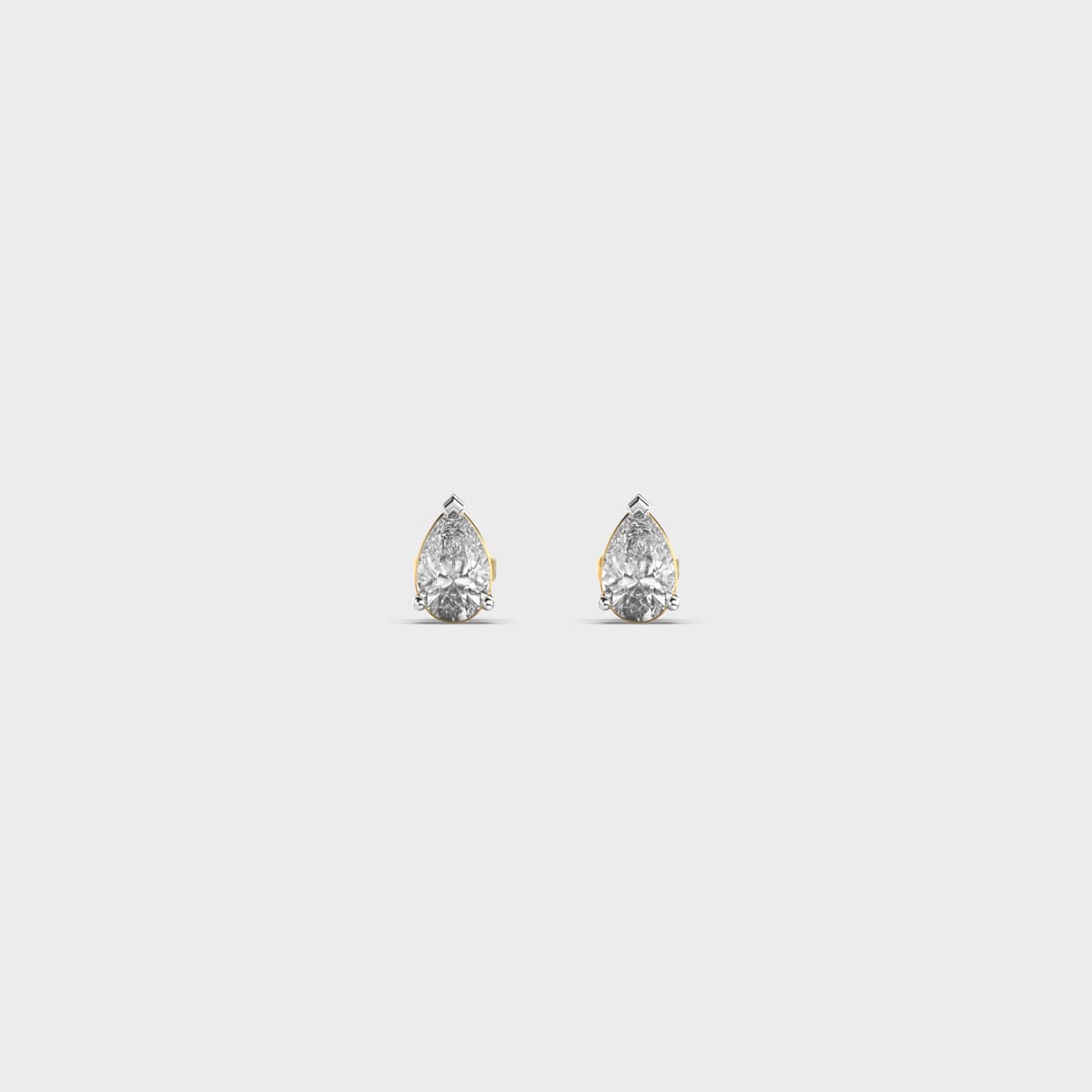 Dainty Pear Cut Diamond Studs