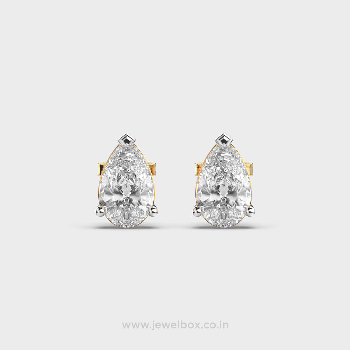 Dainty Pear Cut Diamond Studs